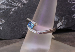 Bypass Style Blue Topaz Ring with Diamonds